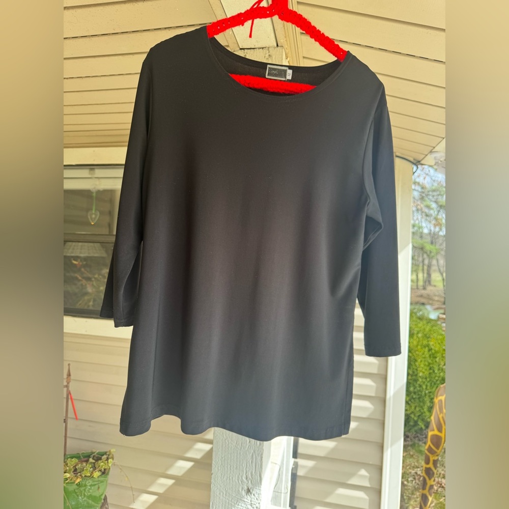 Black three quarter sleeve top.